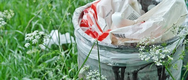 Garbage can in grass